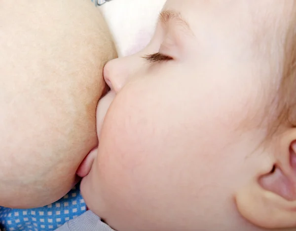 stock image Baby breastfeeding