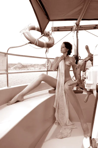 stock image Young woman on a yacht