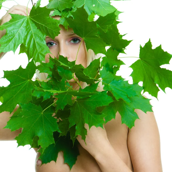 stock image Young blonde woman with leafs